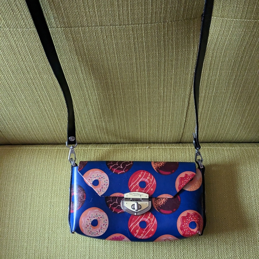 Donut leather clutch